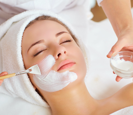 A facial treatment being applied